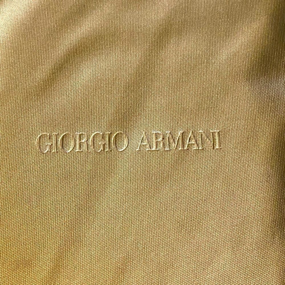 Giorgio Armani and Prada eyeglass cases